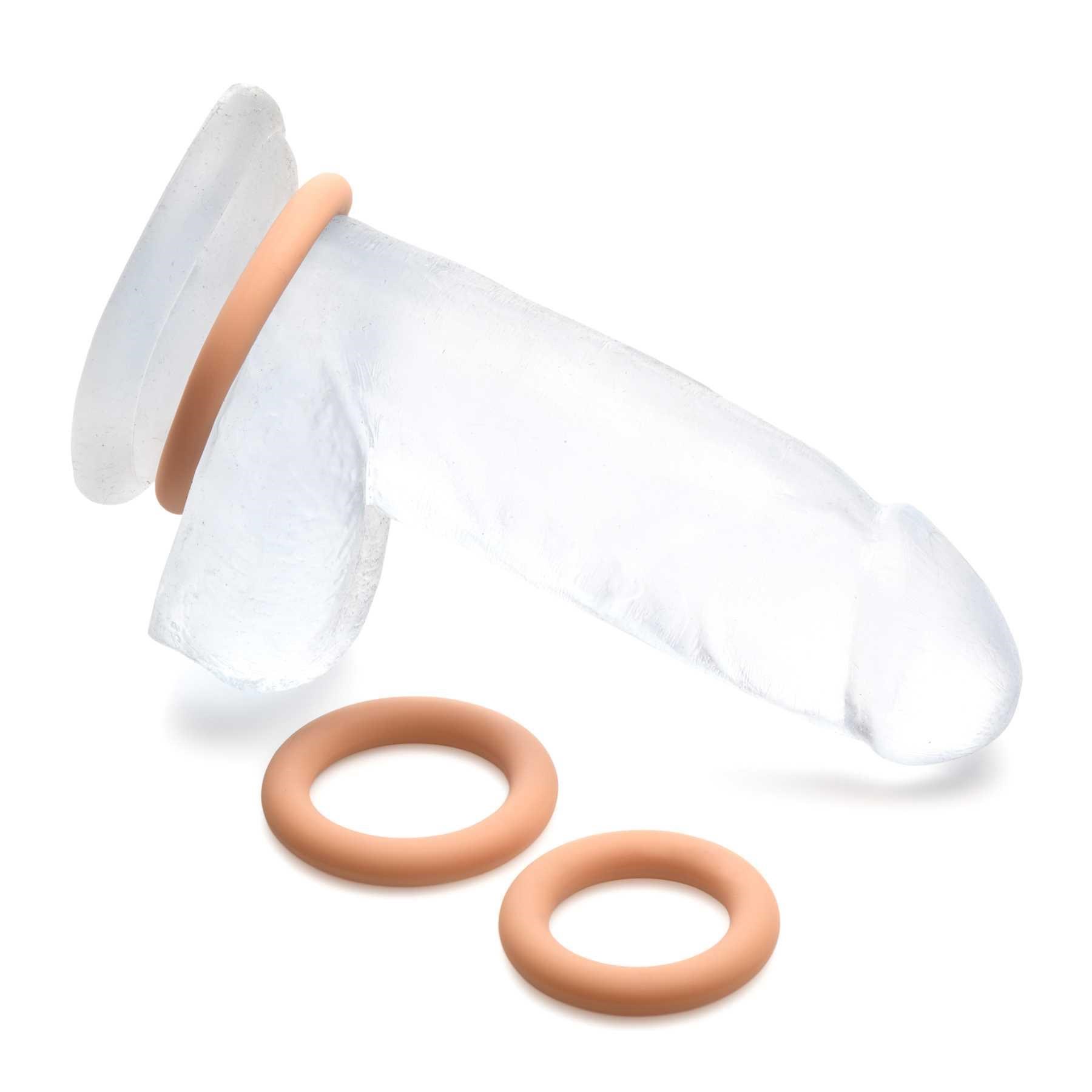 Jock Silicone Cock Ring Set tan with one ring on dildo and other 2 rings besides