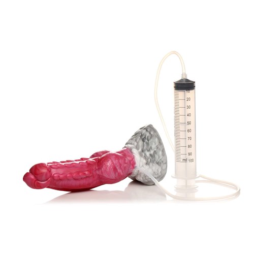 Creature Cock Resurrector Phoenix Squirting Silicone Dildo laying on side with syringe
