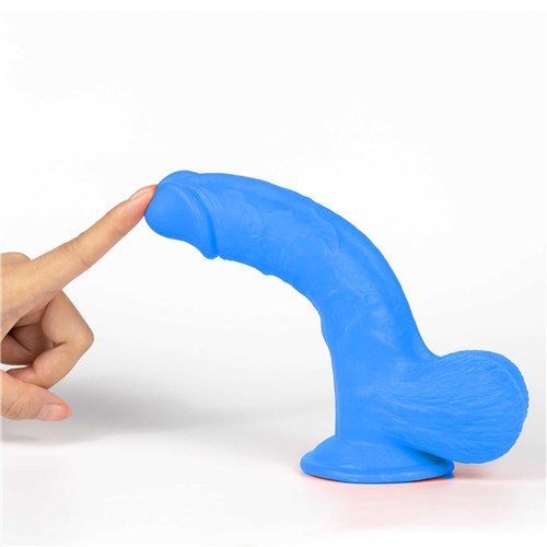 Get Lucky Mr. Navy 7.5 Dual Layer Dildo finger touching tip while flexed