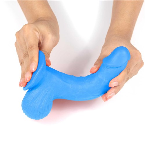Get Lucky Mr. Navy 7.5 Dual Layer Dildo hand flexing dildo and showing suction cup bottom