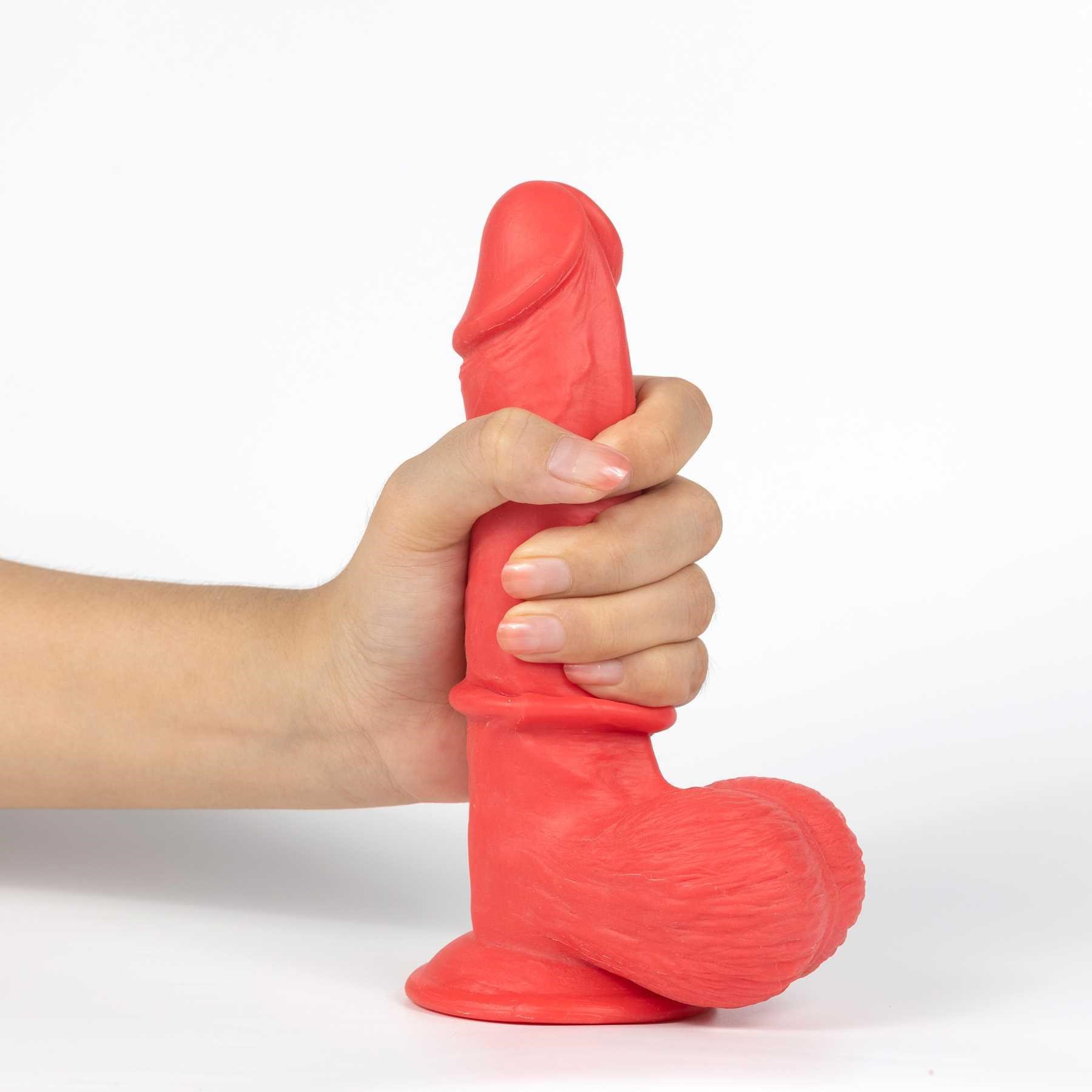 Get Lucky Mr. Ruby 7.5 Dual Layer Dildo hand gripping