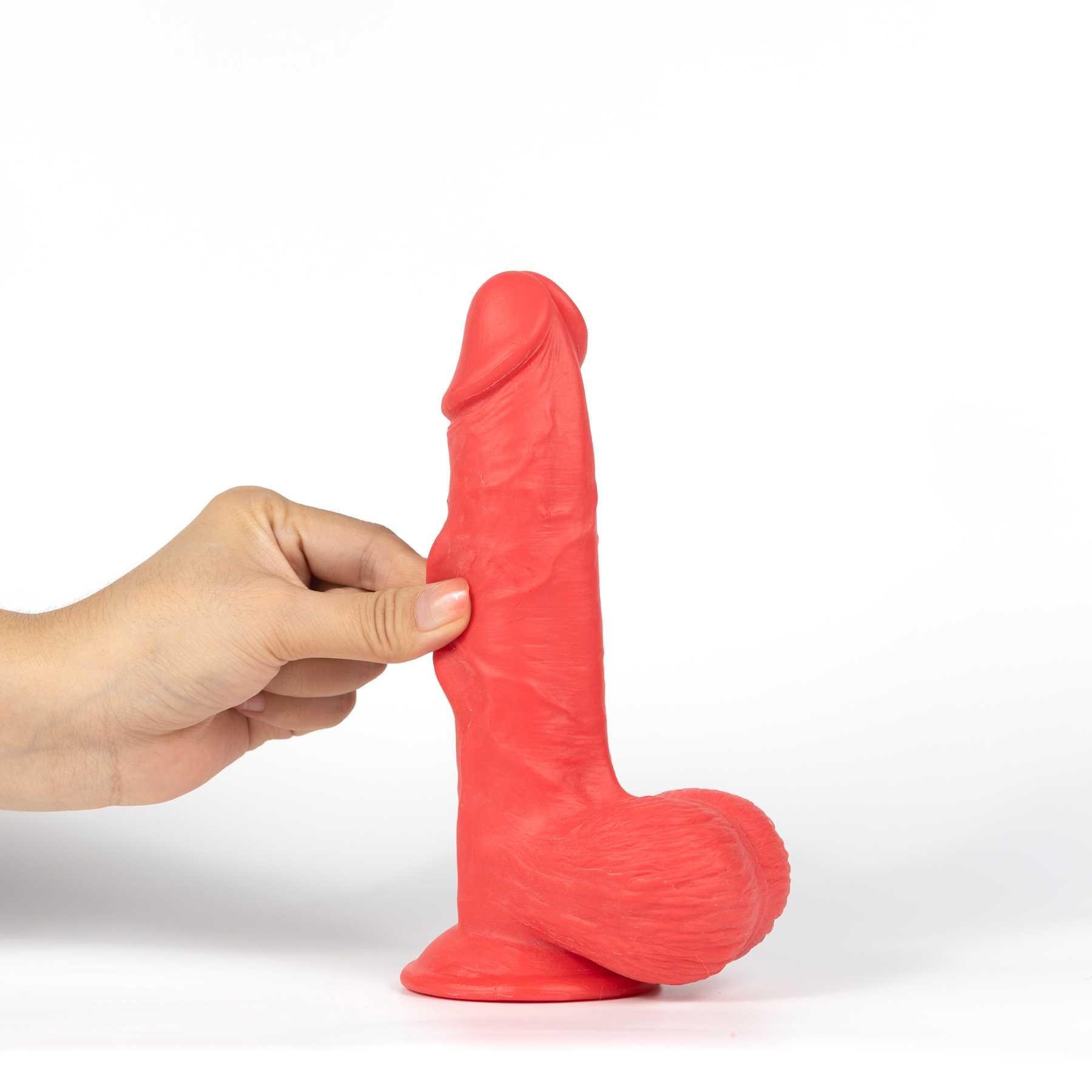 Get Lucky Mr. Ruby 7.5 Dual Layer Dildo fingers pinching skin of shaft