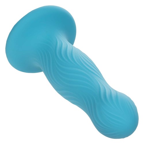 Wave Rider Swell Liquid Silicone Dildo laying on table tip forward