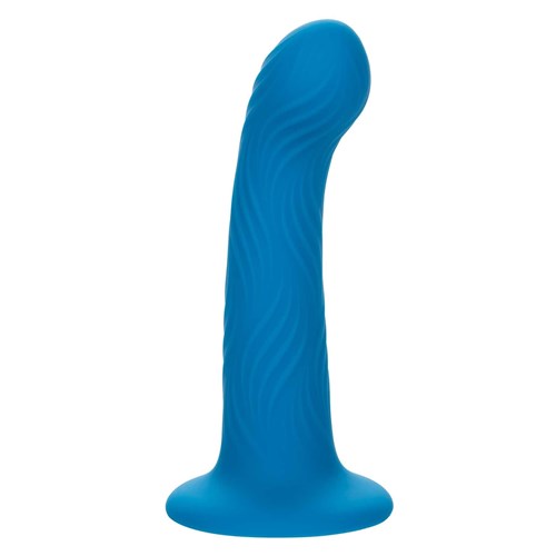 Wave Rider Ripple Liquid Silicone Dildo standing on table