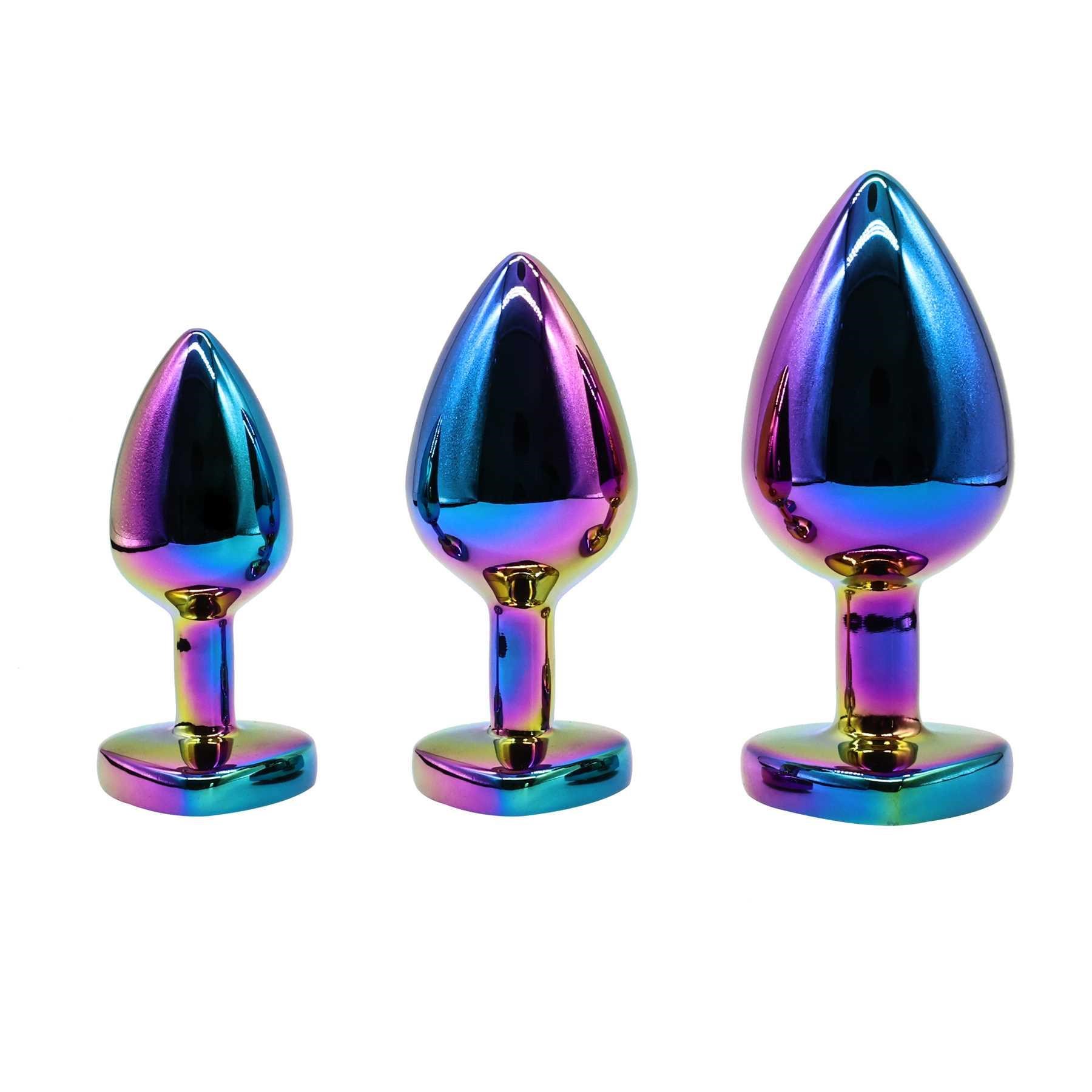 Adam & Eve Rainbow Heart Anal Training Set standing on table