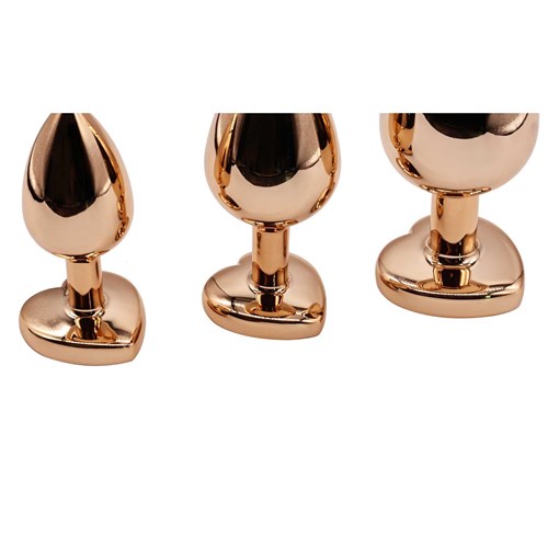 Adam & Eve Rose Gold Pink Heart Anal Training Set close up of base ends