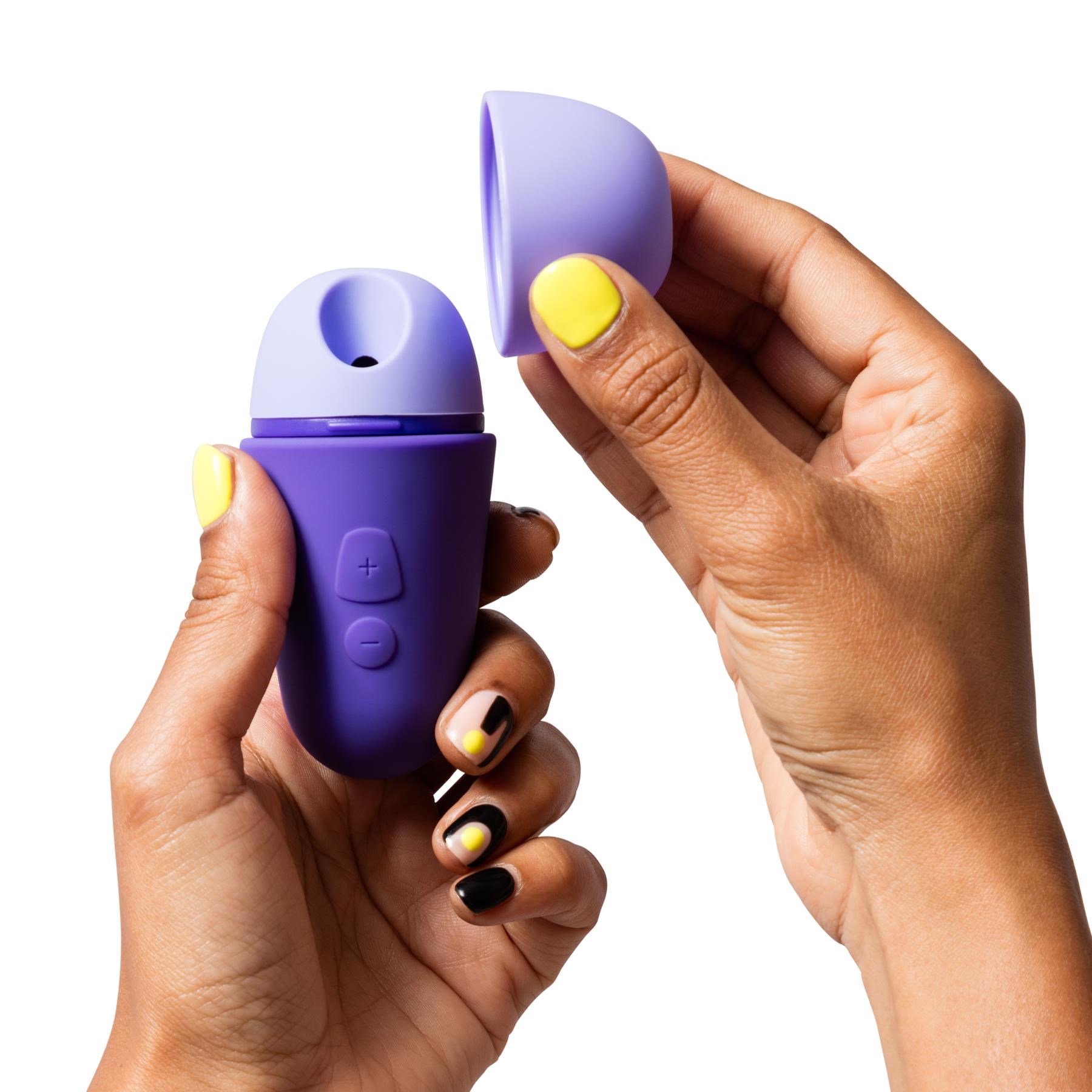 Romp Free X Pleasure Air Clitoral Stimulator in hand 2